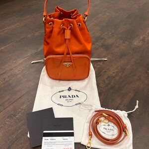 Prada Tessuto Nylon Drawstring Bucket Mini Bag in Papaya